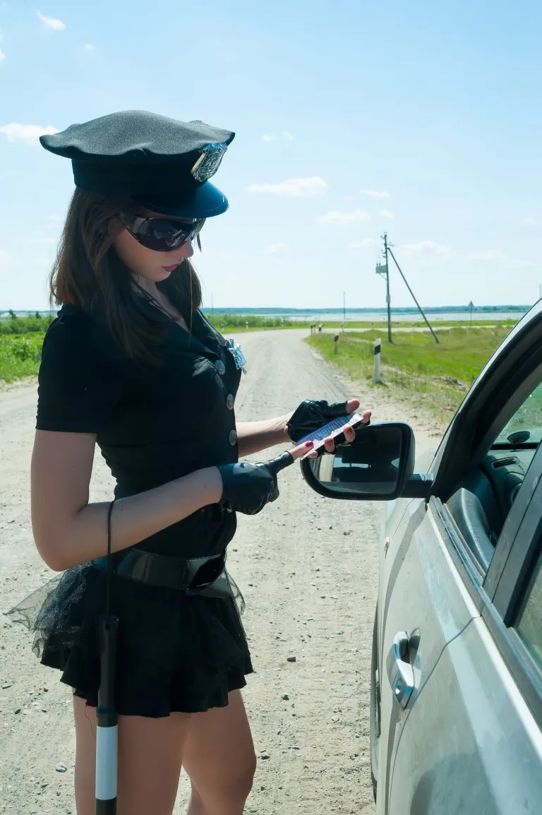 Sexy police woman on road